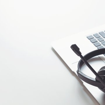 axvoice voip service price cost headset on laptop 